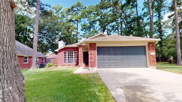 single story home featuring a garage and a front lawn