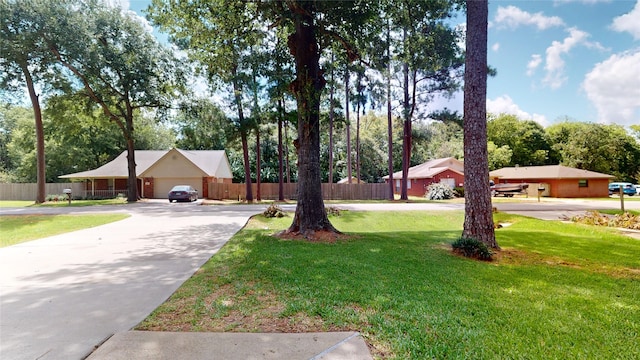 view of yard with a garage