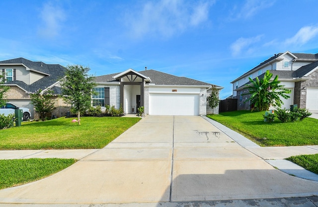 view of front facade featuring a front lawn and a garage