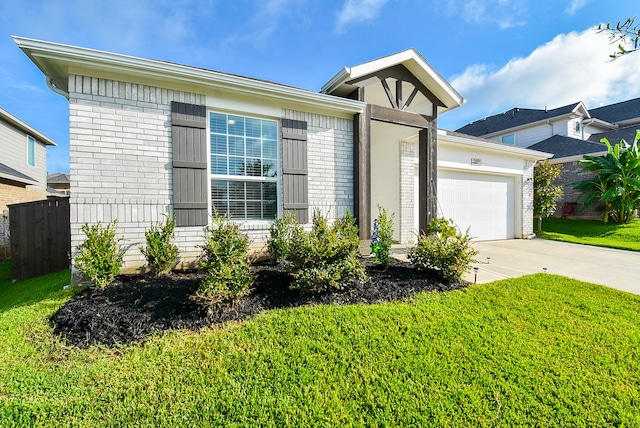 ranch-style house with a garage and a front lawn