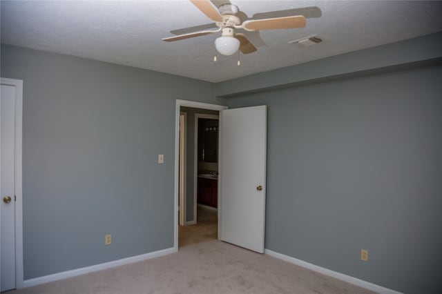 interior space featuring ceiling fan