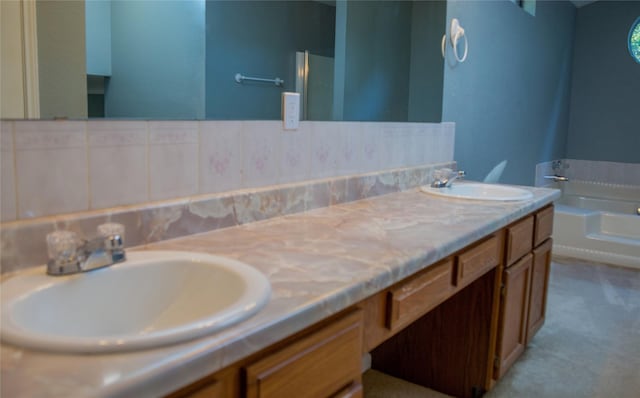 bathroom with vanity and a bathing tub