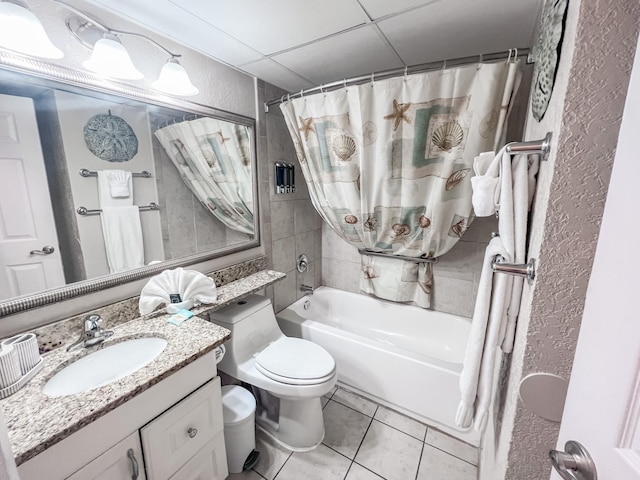 full bathroom featuring vanity, tile patterned floors, shower / bath combination with curtain, and toilet