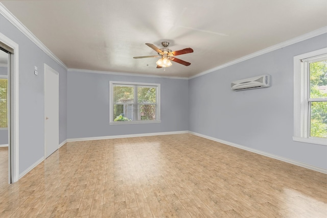 spare room with a wall mounted air conditioner, crown molding, light hardwood / wood-style floors, and ceiling fan