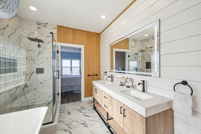 bathroom featuring vanity, walk in shower, and wooden walls