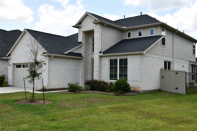 exterior space with a garage and a front lawn