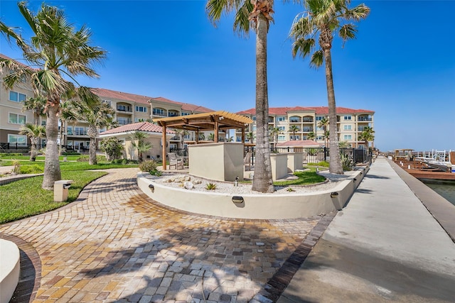 301 E Houston St Unit 3301, Port Isabel, TX 78578 - view of property's community featuring a pergola and fence
