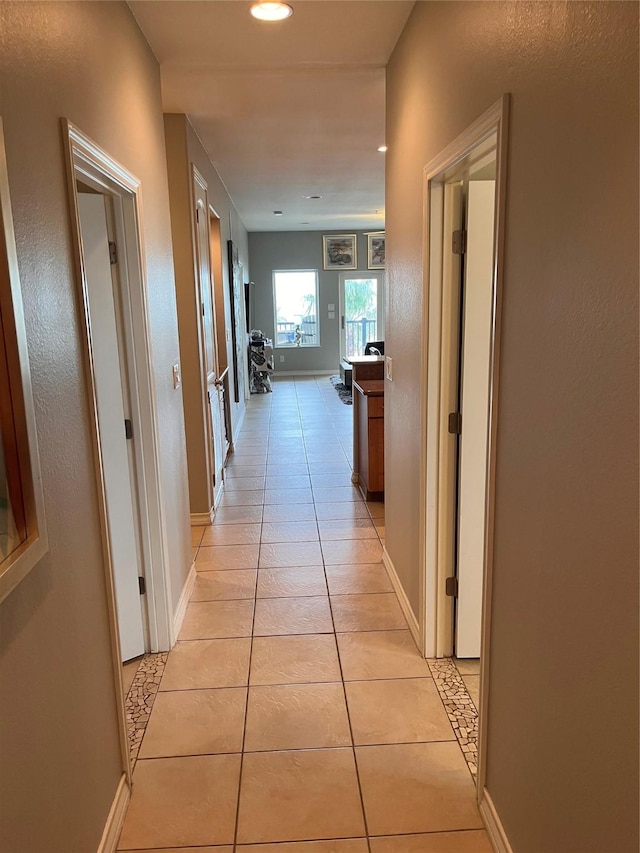 301 E Houston St Unit 3301, Port Isabel, TX 78578 - hall with light tile patterned floors, recessed lighting, and baseboards