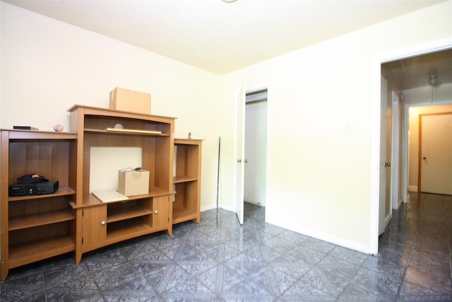 unfurnished bedroom with tile patterned floors