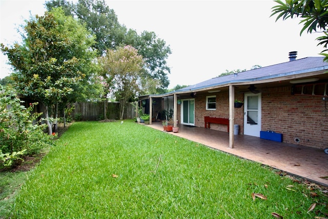 view of yard with a patio area