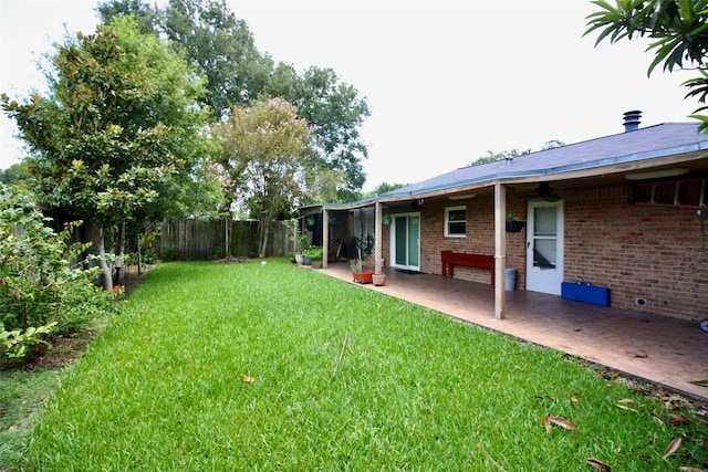 2202 Jones St, Rosenberg, TX 77471 - view of yard featuring a patio