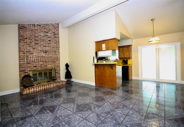 2202 Jones St, Rosenberg, TX 77471 - unfurnished living room with vaulted ceiling, baseboards, and a fireplace
