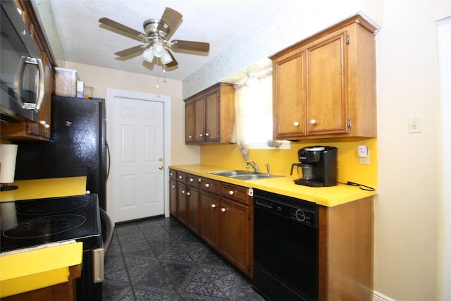 2202 Jones St, Rosenberg, TX 77471 - kitchen featuring black appliances, a sink, light countertops, ceiling fan, and brown cabinetry