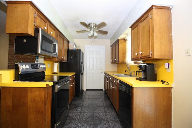 2202 Jones St, Rosenberg, TX 77471 - kitchen with appliances with stainless steel finishes, a sink, ceiling fan, light countertops, and brown cabinetry