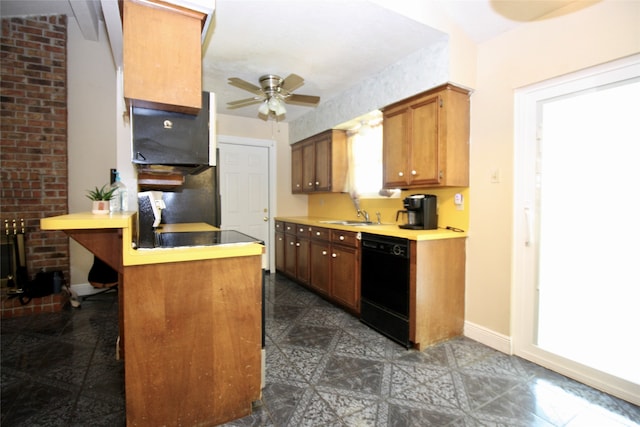 kitchen with black dishwasher, dark tile patterned flooring, and ceiling fan