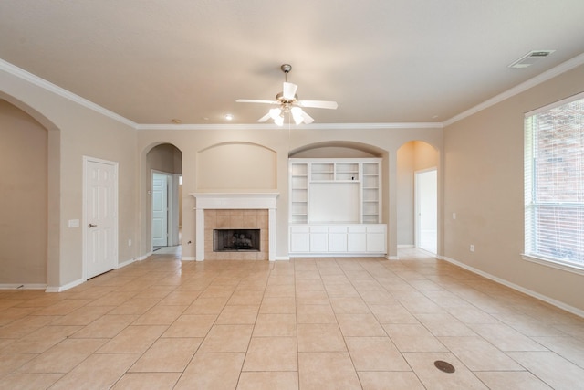 unfurnished living room featuring light tile patterned floors, ornamental molding, visible vents, and a ceiling fan