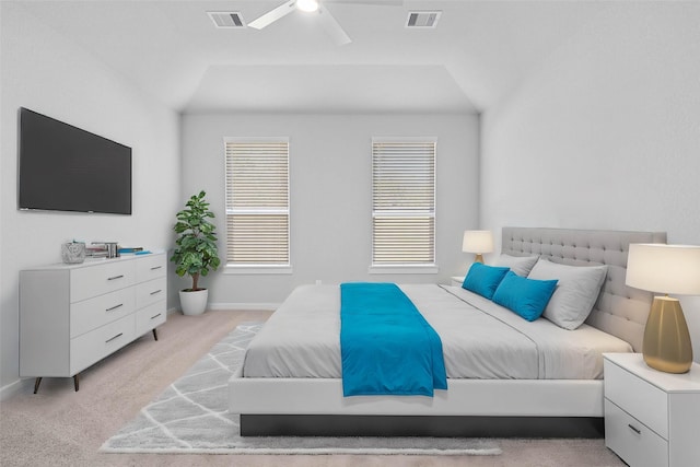 carpeted bedroom with ceiling fan and lofted ceiling