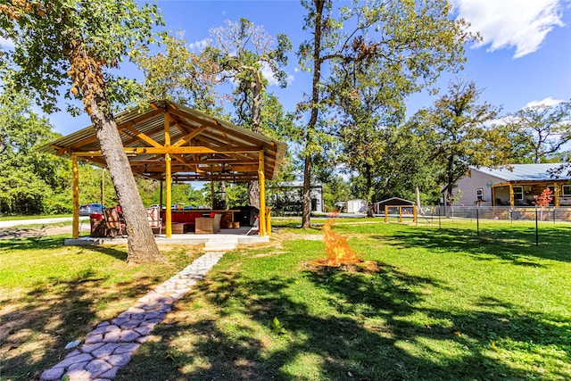 view of yard featuring a gazebo and a hot tub