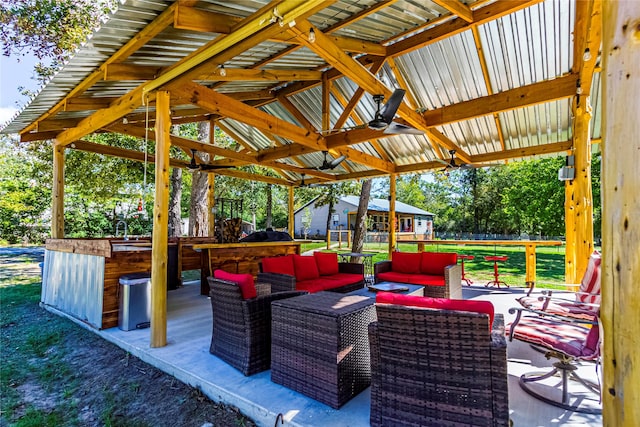 view of patio with an outdoor bar and outdoor lounge area