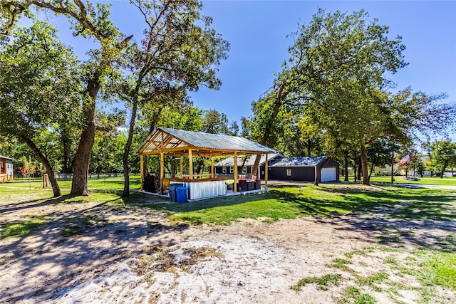 surrounding community with an outbuilding and a gazebo