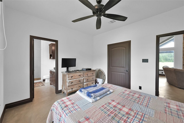 bedroom with ceiling fan and connected bathroom