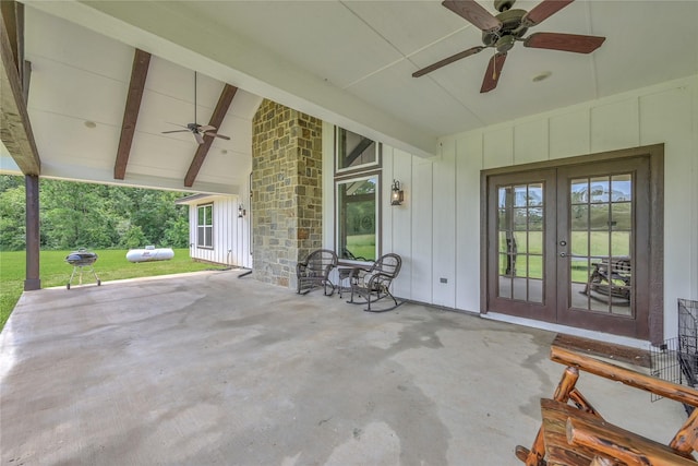 view of patio / terrace featuring ceiling fan and french doors