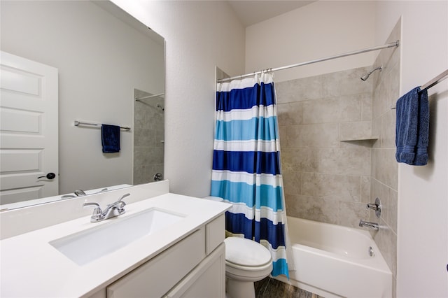 full bathroom featuring toilet, shower / tub combo with curtain, and vanity