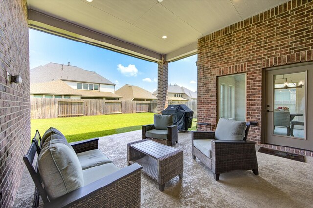 view of patio / terrace featuring a grill and an outdoor living space