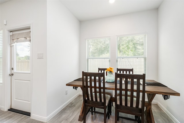 dining area featuring wood-type flooring