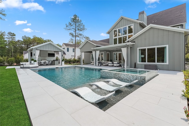 view of pool featuring an outdoor living space, ceiling fan, and a patio area