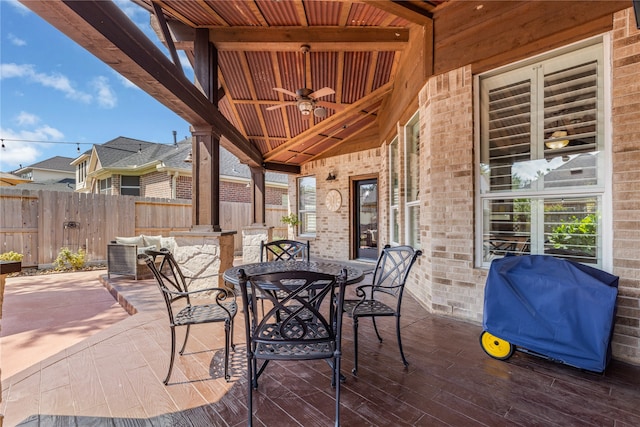 view of patio featuring ceiling fan and grilling area