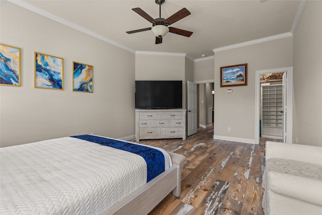 bedroom with ceiling fan, dark wood-type flooring, and crown molding