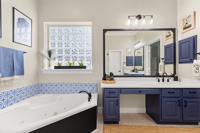 bathroom featuring vanity, a bathing tub, and tile patterned floors