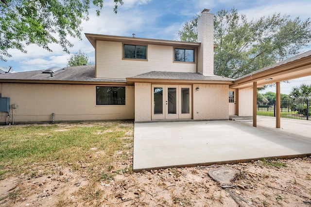 rear view of property with a patio