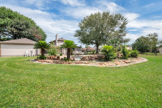 view of yard featuring fence