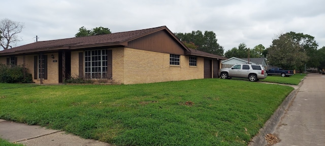 view of property exterior featuring a yard