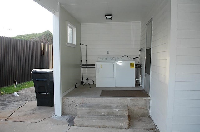 exterior space featuring separate washer and dryer