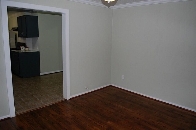 tiled empty room with ornamental molding