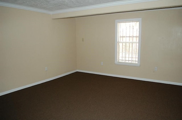 carpeted empty room with ornamental molding