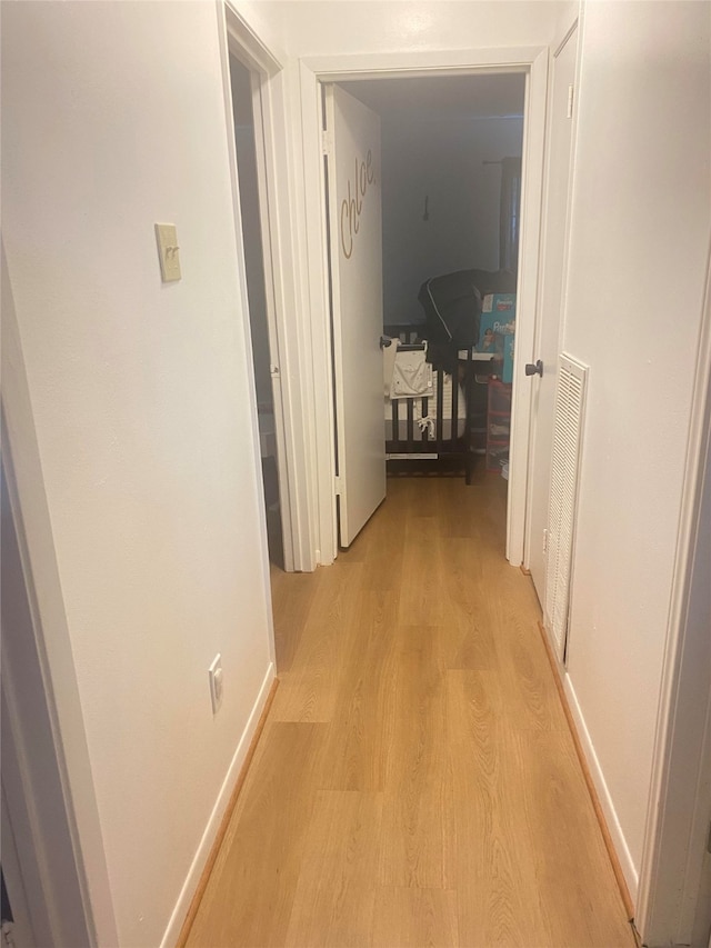 hallway featuring light hardwood / wood-style floors