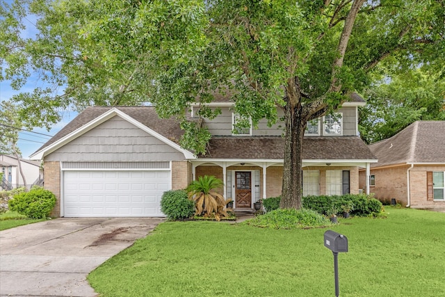 view of front of house with a garage and a front yard