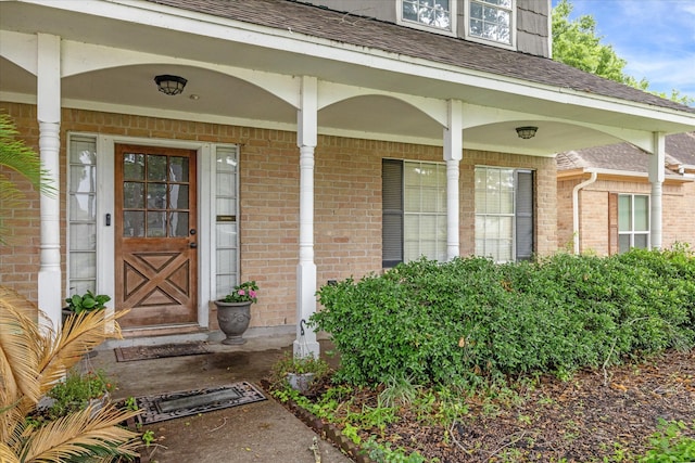 doorway to property with a porch