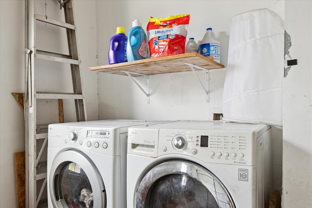 washroom featuring washer and dryer