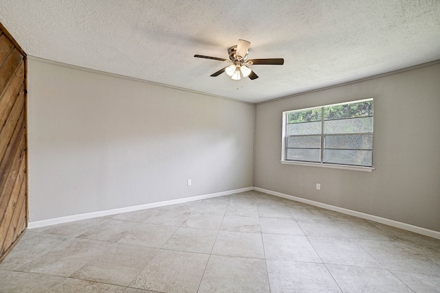 unfurnished room featuring light tile patterned flooring, a textured ceiling, and ceiling fan