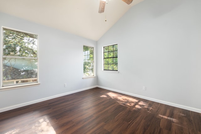 empty room featuring high vaulted ceiling, ceiling fan, baseboards, and dark wood finished floors