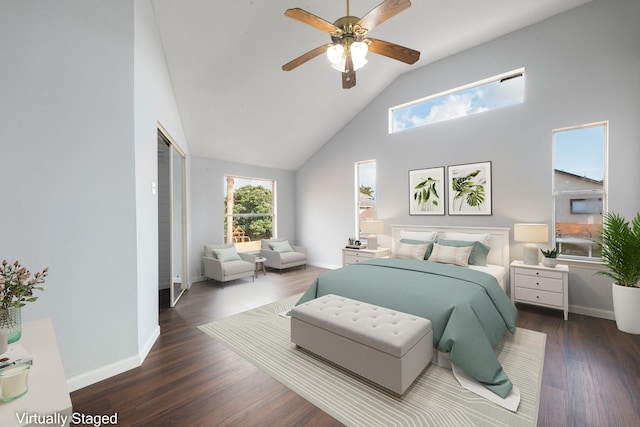 bedroom with high vaulted ceiling, ceiling fan, baseboards, and wood finished floors