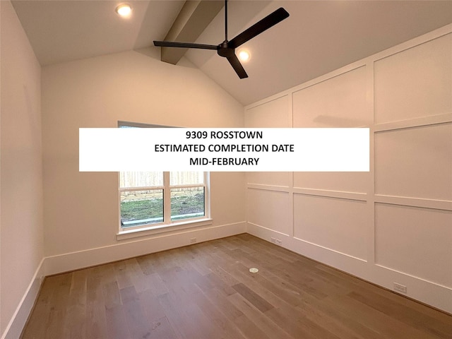 empty room featuring hardwood / wood-style floors, vaulted ceiling with beams, and ceiling fan