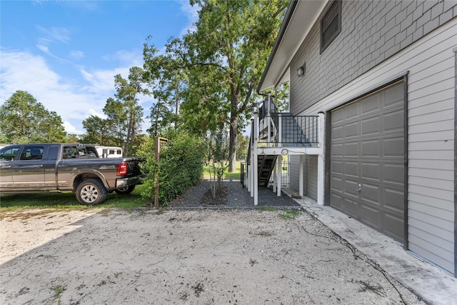 view of yard with a garage