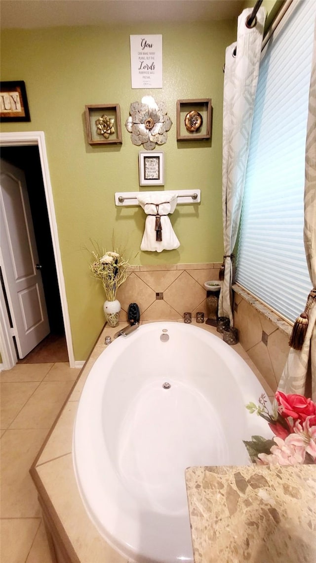 bathroom featuring a tub to relax in