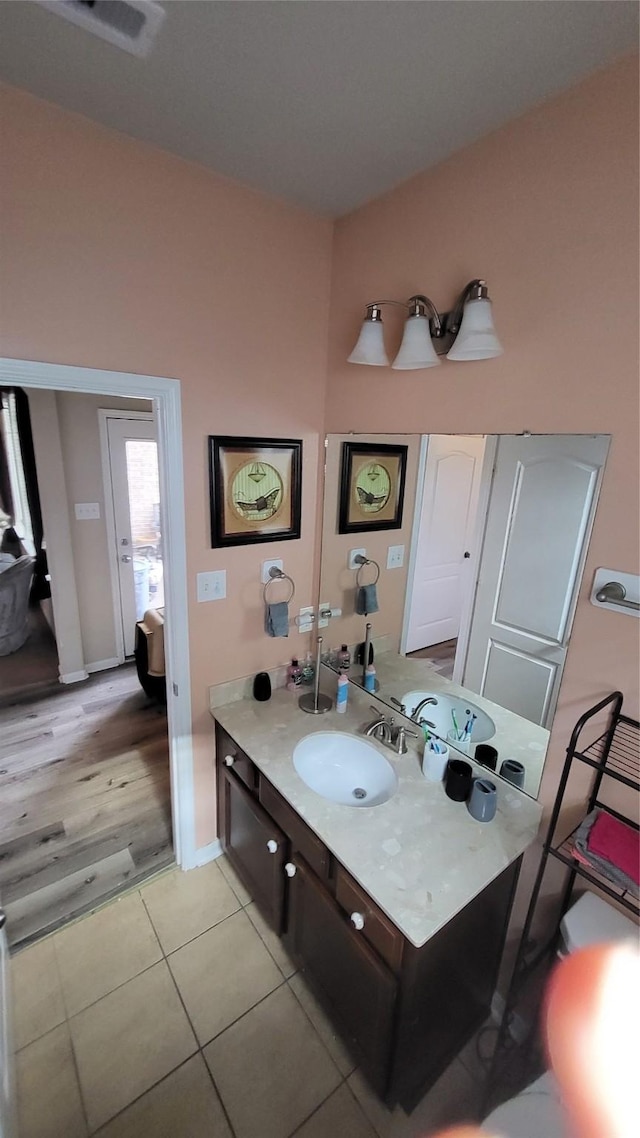 bathroom with vanity and tile patterned floors